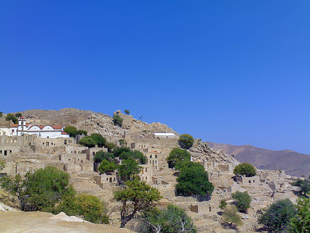  Fotografie Attraktion  von Griechenland Verlassene Häuser im Dorf Mikro Chorio